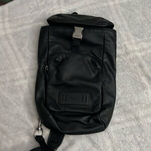 Coach single strap backpack